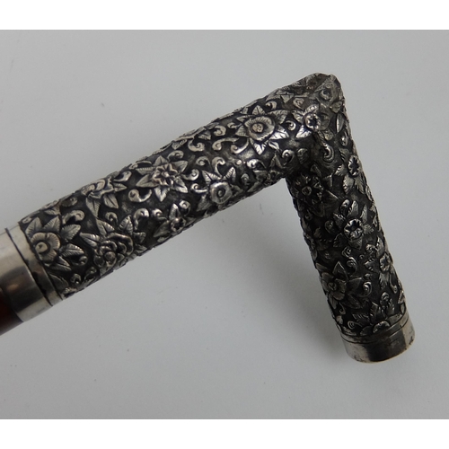 525 - A Chinese silver cane handle