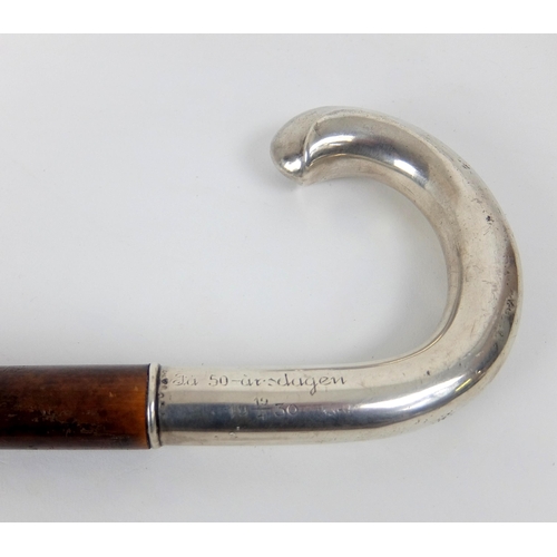 525 - A Chinese silver cane handle