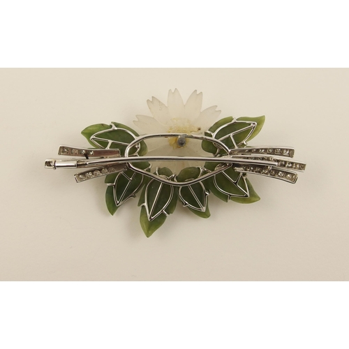 53 - A substantial green hardstone and diamond brooch