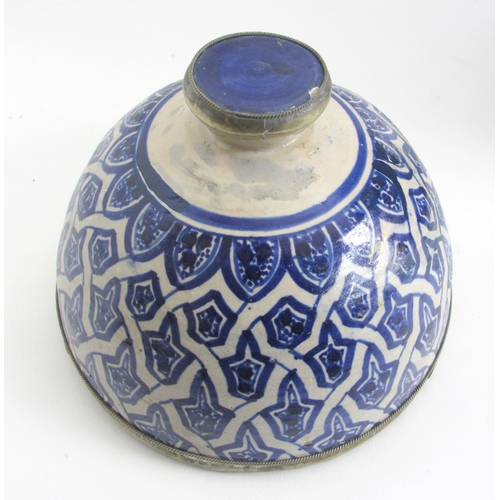 538 - A Persian blue and white baluster vase and cover