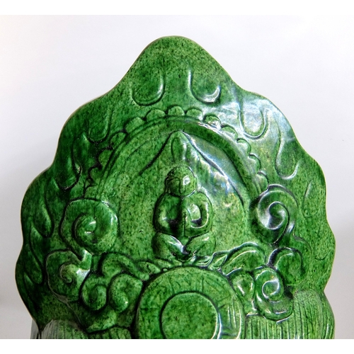 539 - A Chinese green glazed head of buddha