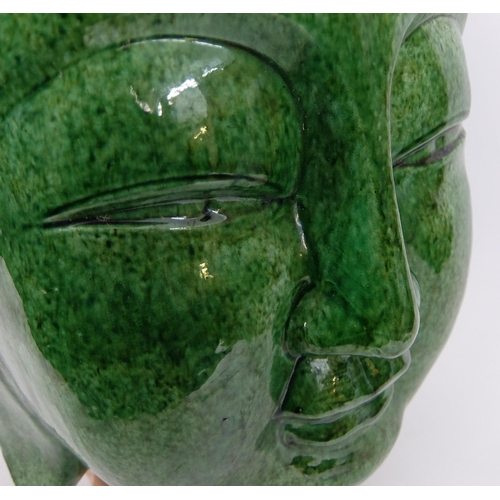 539 - A Chinese green glazed head of buddha