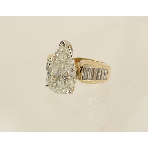 54 - A 6.79ct pear shaped brilliant cut diamond ring