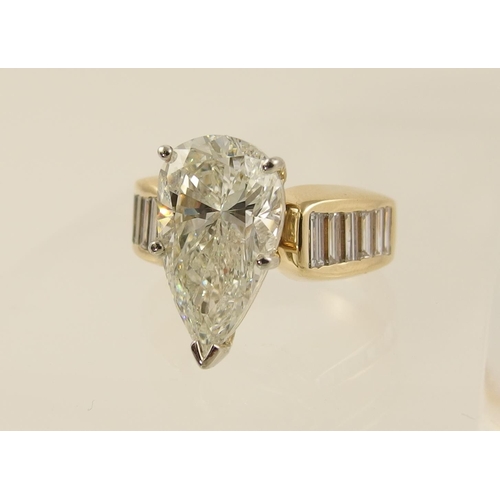 54 - A 6.79ct pear shaped brilliant cut diamond ring