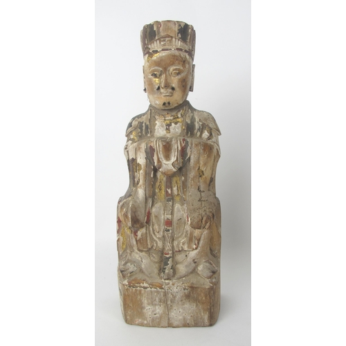 543 - A Chinese carved wood and polychrome devotional figure