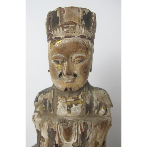 543 - A Chinese carved wood and polychrome devotional figure