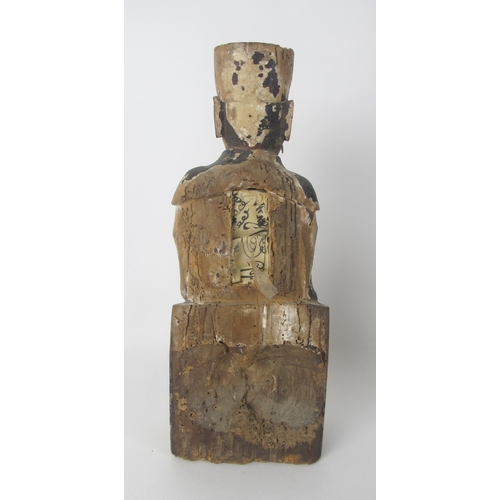 543 - A Chinese carved wood and polychrome devotional figure