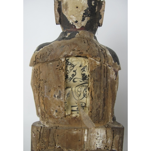 543 - A Chinese carved wood and polychrome devotional figure