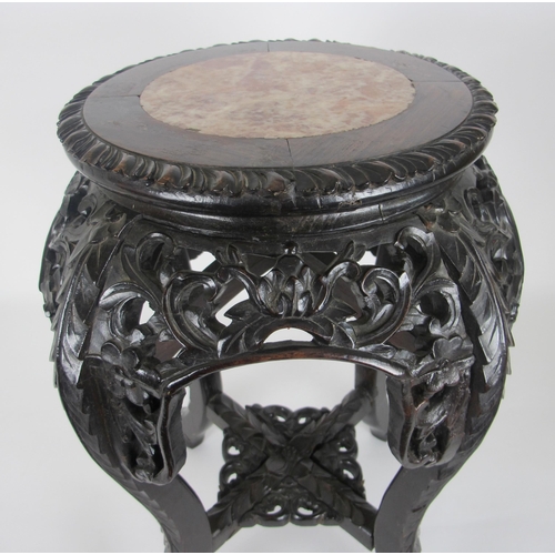 547A - A Chinese rosewood and marble inset plant pedestal