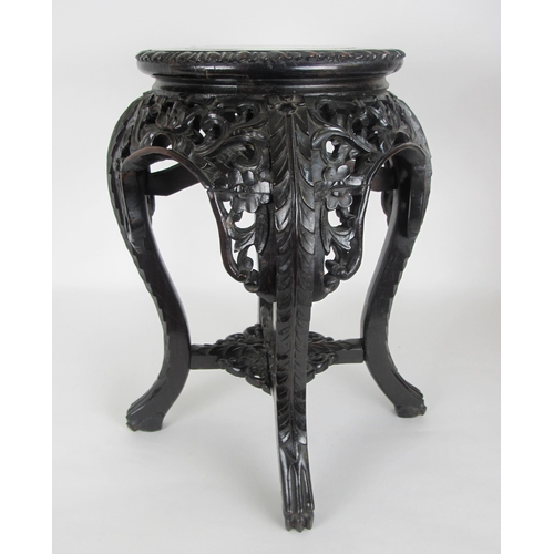 547A - A Chinese rosewood and marble inset plant pedestal