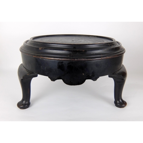 548A - A large ebonised wood vase stand