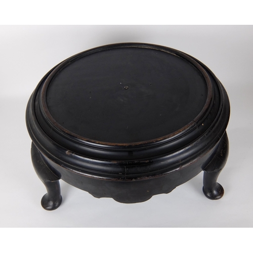 548A - A large ebonised wood vase stand