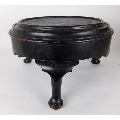 548A - A large ebonised wood vase stand