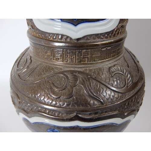 548B - A Chinese moulded baluster vase