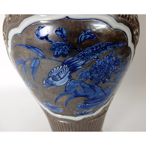 548B - A Chinese moulded baluster vase