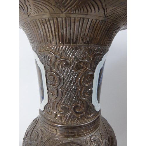 548B - A Chinese moulded baluster vase