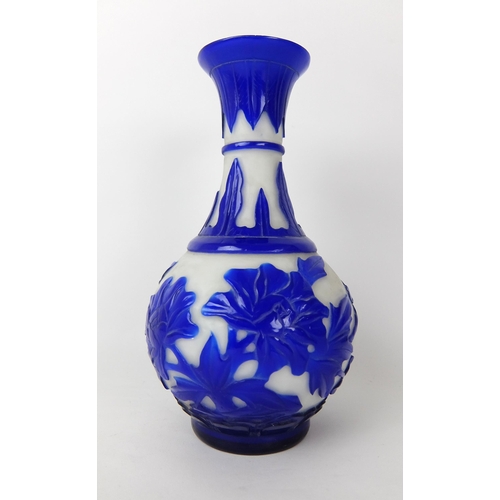 548D - A Chinese blue overlaid cut glass vase