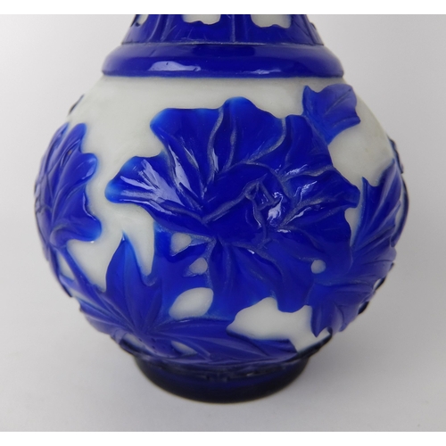 548D - A Chinese blue overlaid cut glass vase