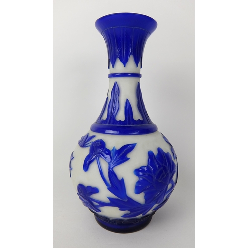 548D - A Chinese blue overlaid cut glass vase