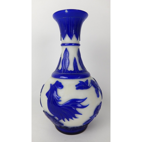 548D - A Chinese blue overlaid cut glass vase