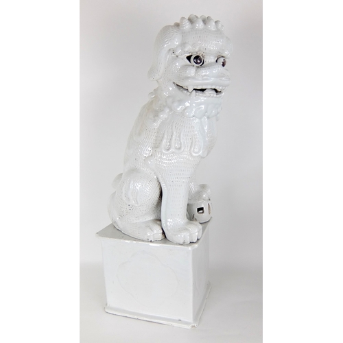 548F - A Chinese white glazed temple guardian