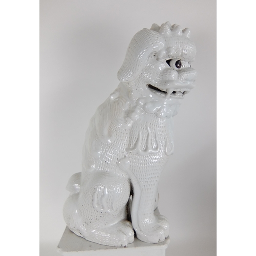 548F - A Chinese white glazed temple guardian