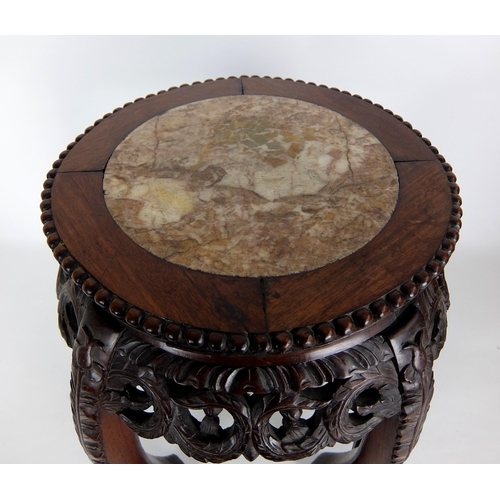 549 - A Chinese hardwood pedestal