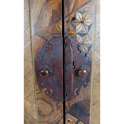 550A - A Japanese lacquered and marquetry table cabinet