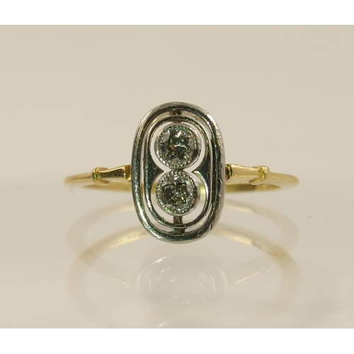 56 - An Edwardian twin diamond ring