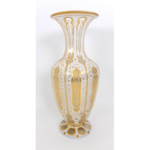 656 - A Bohemian Persian design opaque overlaid glass faceted vase