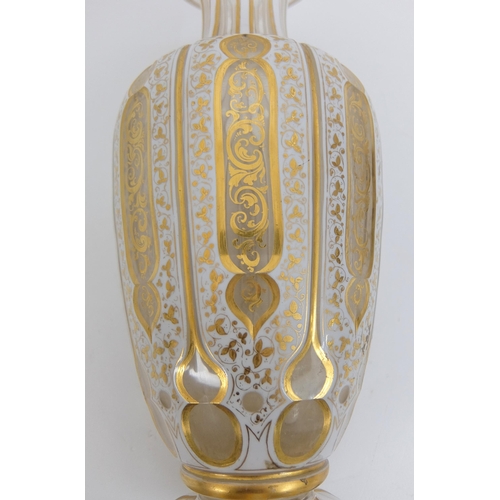 656 - A Bohemian Persian design opaque overlaid glass faceted vase