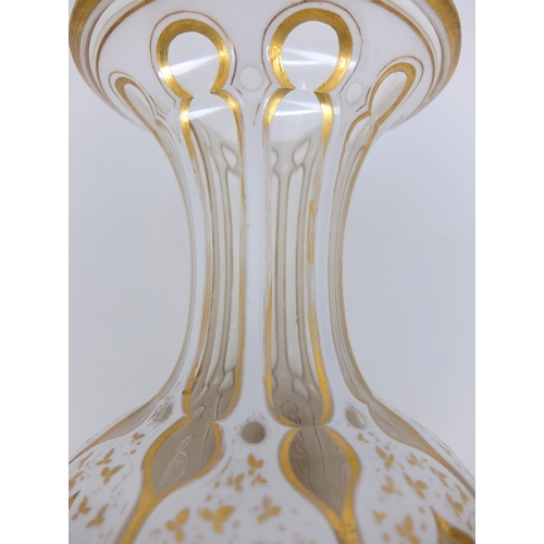 656 - A Bohemian Persian design opaque overlaid glass faceted vase