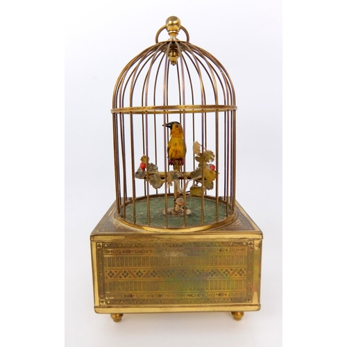 657 - A French gilt metal musical automaton birdcage