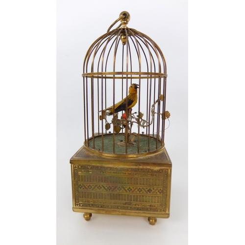 657 - A French gilt metal musical automaton birdcage