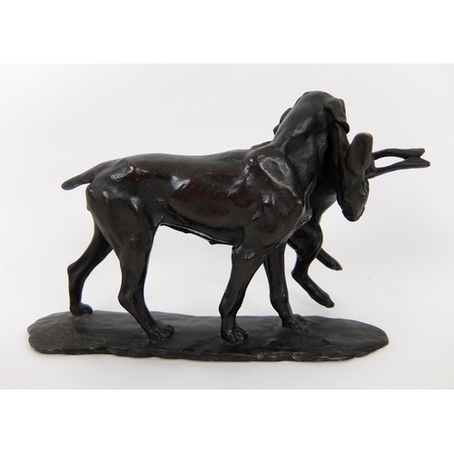 658 - A bronze of a hound with hare grasped in its mouth