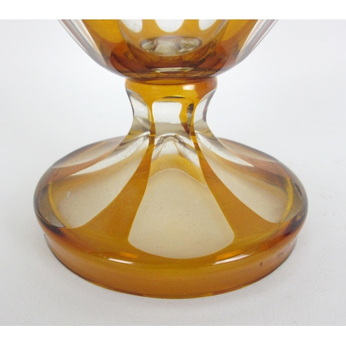 671 - A Bohemian amber flash and cut glass vase and cover