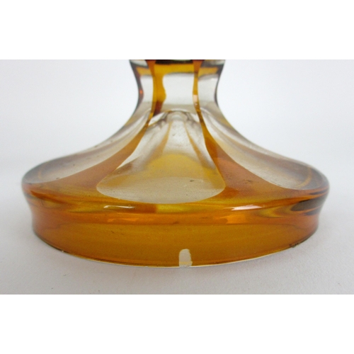 671 - A Bohemian amber flash and cut glass vase and cover