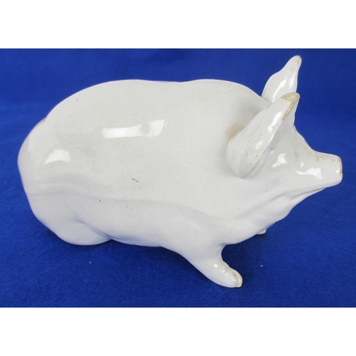 675B - A Wemmys Ware model of a piglet