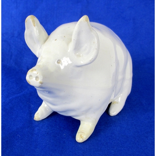 675B - A Wemmys Ware model of a piglet