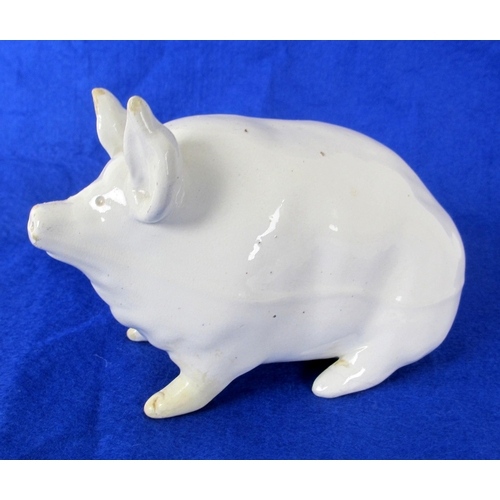 675B - A Wemmys Ware model of a piglet