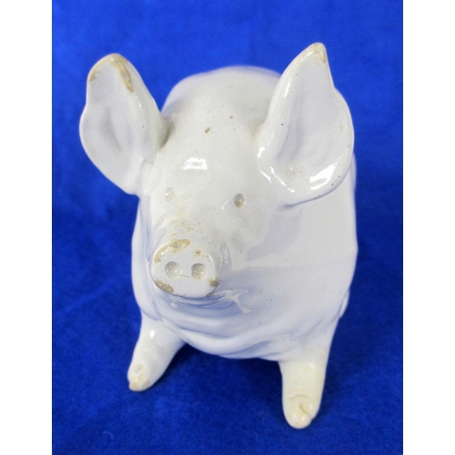 675B - A Wemmys Ware model of a piglet