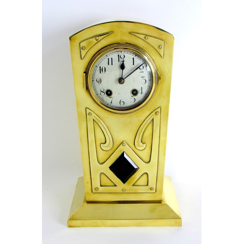 678 - A brass cased Art Nouveau chiming mantle clock