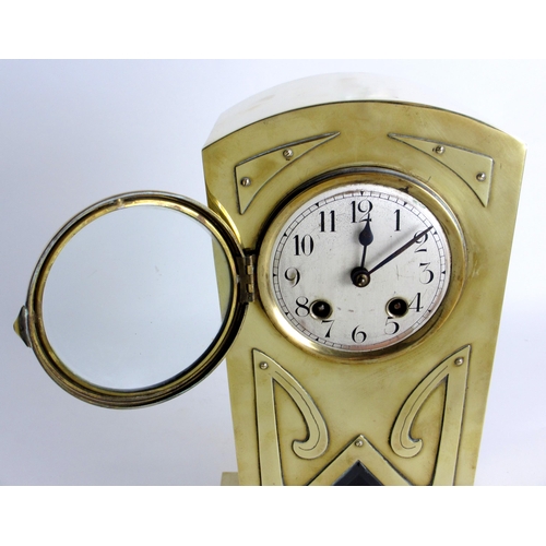 678 - A brass cased Art Nouveau chiming mantle clock