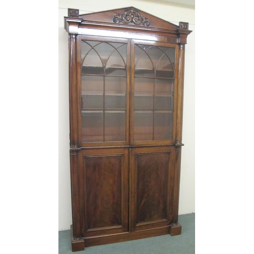 681 - A mid Victorian mahogany bookcase on cupboard base