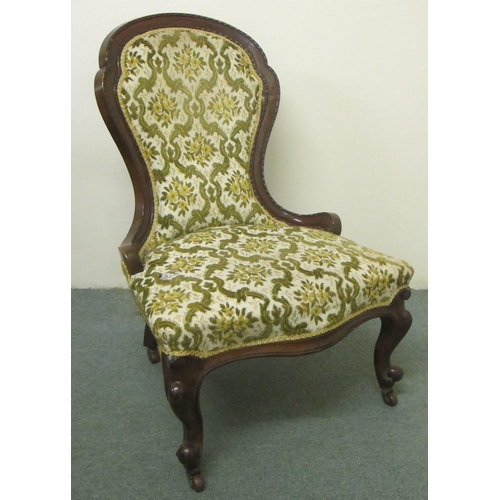 694 - A Victorian mahogany framed ladies armchair