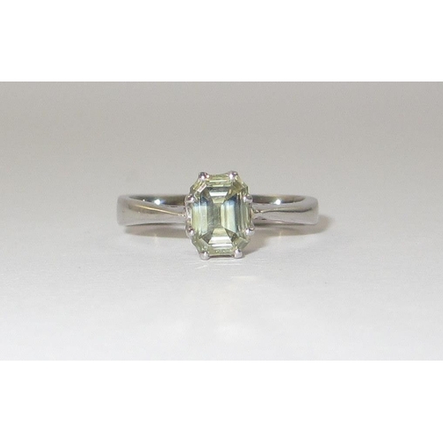 70 - A pale yellow diamond solitaire ring