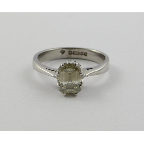 70 - A pale yellow diamond solitaire ring