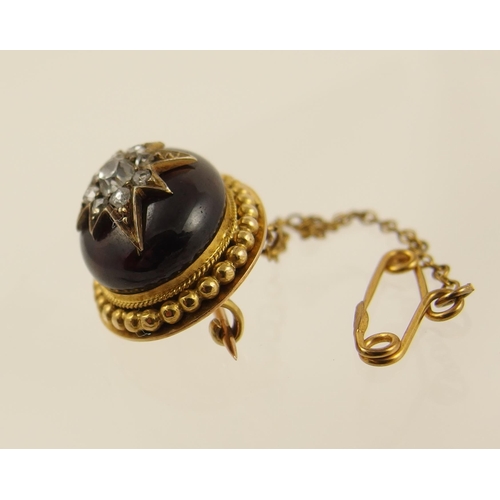 81 - A Victorian Garnet and diamond brooch