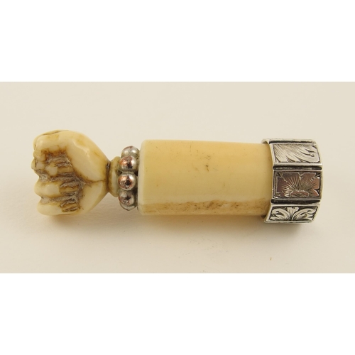 86 - A carved bone fist shaped desk seal