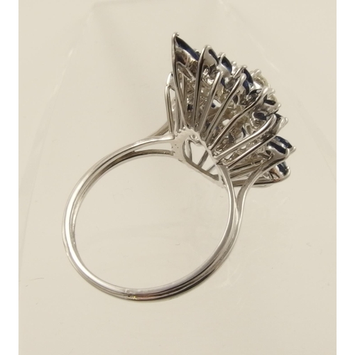 103 - A diamond abstract design ring